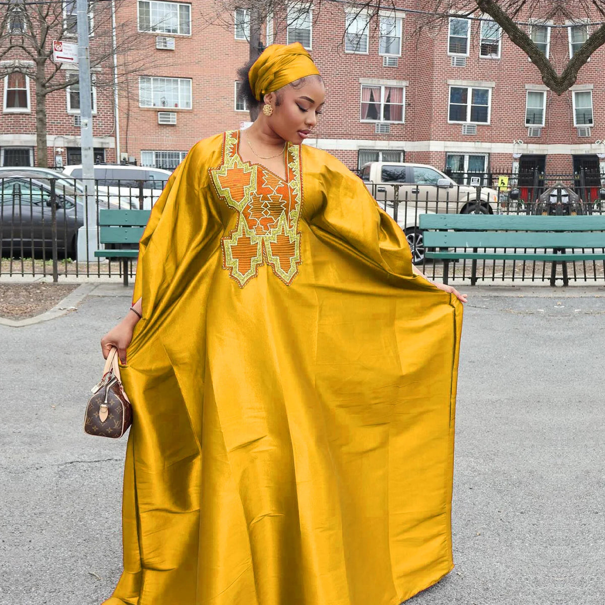 Women's gold embroidered African abaya church dress lifestyle