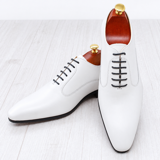 Men's white leather pointed oxford dress shoes clean product photo