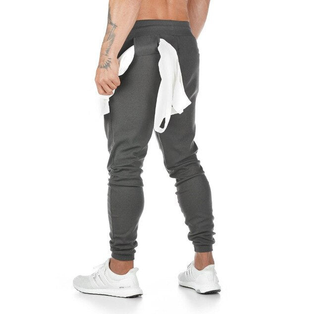 2021 new Men Casual Pants Solid Color Gyms Fitness Workout Sportswear Trousers Autumn Winter Male Crossfit Track Pants